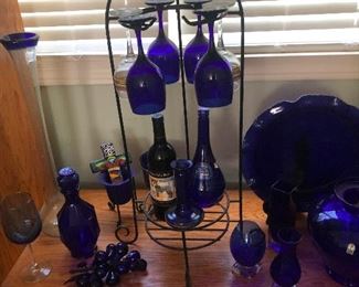 Cobalt blue glassware hanging by its feet as punishment for disappointing the king