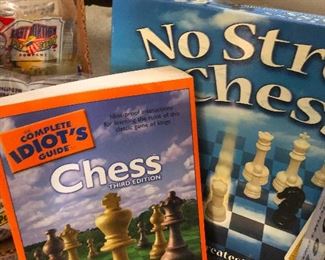 lots of chess stuff! "Can you please teach me to play chess?" is something I never said to anyone. Why? Because I can just BUY THESE BOOKS!