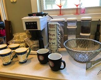 Lots of coffee cups and coffee makers!