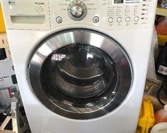 LG washing machine, located in garage and its in working order.  The matching Dryer is upstairs in home. We don't ask why