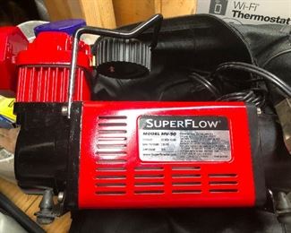 SuperFlow, by the time this sale starts on Wednesday I will know what that is and have priced it appropriately -- it's a SuperFlow portable air pump!! See! Told ya!