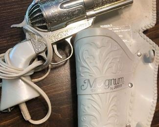 gun of some kind -- oh, wait, it's a HAIR DRYER