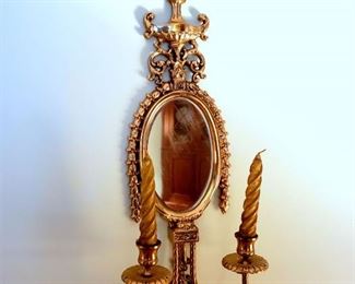 Pair of brass mirrored sconces