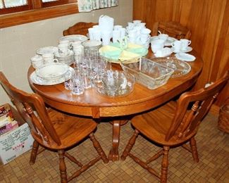 Oak table with leaf and 4 chairs