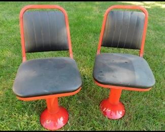 Two Nice Red and Black Swivel Chairs.