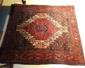 Vintage hand woven Persian Heriz rug, 100% wool face, measures 4' 10" x 4' 2".