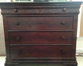 Antique American Empire mahogany 4-drawer chest.