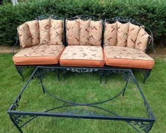 3-Piece vintage wrought iron outdoor "couch" and see-through matching coffee table.