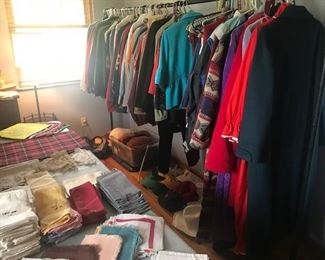 Women's clothing sized L and XL. Beautiful antique napkins, tablecloths, and linens. Costume and vintage clothing too.