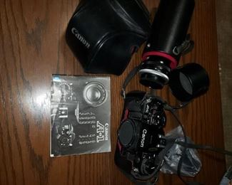 Canon A-1 camera with case, zoom lens, manual.