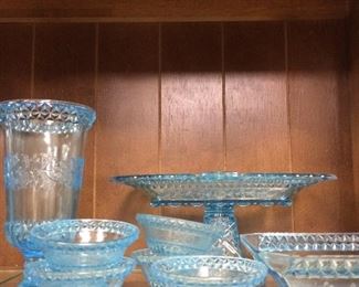 Many pieces of turquoise glassware!