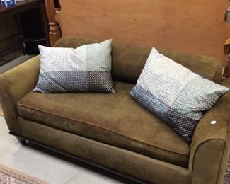 Great upholstered bench with matching rolled pillow for the back..... nice for the foot of your bed or family room!