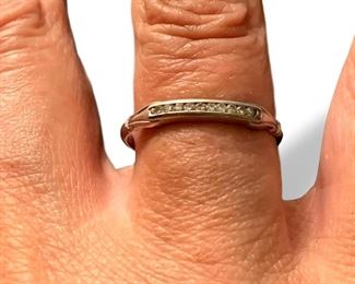 Platinum setting stackable diamond ring.