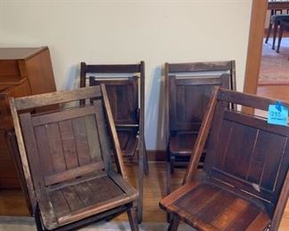 Four folding wooden chairs https://ctbids.com/#!/description/share/208666