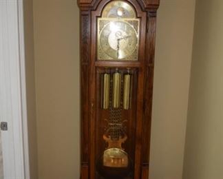 Howard Miller Grandfather Clock 21" W X 80" T. Not working.