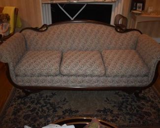 Beautiful Antique Victorian Sofa in beautiful condition! Featuring carved Swam Heads.