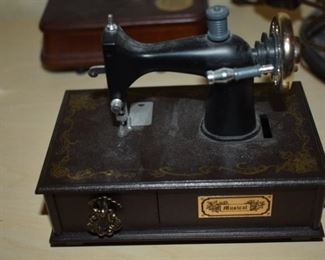 Collectible Antique Sewing Machine Music Box plays "Buttons and Bows"
