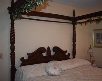 Gorgeously Carved Bedroom Suite featuring Barley Twist, Pie Crust Edging, Claw Feet, and More. Bedroom Suite consists of Mirrored 8 Drawer Dresser, Highly Carved 4 Poster Bed and 2 matching End Tables!!!