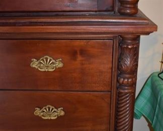 Beautifully Carved Armoire featuring Rope twist sides accented with Tudor Leaf Carvings, 8 Drawers and Shelving behind the Double Doors.