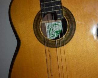 Miquel and Company Flamenco Guitar 1963. World Famous Luthier, Cuba's premier luthier, who escaped from Cuba during the Castro revolution and settled in Little Miami to continue making his extraordinary Flamenco Guitar's. He escaped Cuba in 1961 on a self-made raft bringing with him as much of his special woods as he could transport so that he could continue his craft here in the USA. He settled in Miami to continue his artistic genius in making some of the World's Finest Flamenco Guitars.