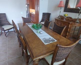 Tommy Bahama Table with 2 Leafs, 6 Mangrove Side Chairs & 2 Cruz Bay Host Chairs. Exclusive Statement Dining Room Set. Check out original pricing at Kalin Furniture in Ormond Beach Over $12,000 New! Big Opportunity to purchase during this sale!!