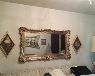 Mirror with matching pictures on either side