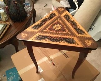Small triangular wooden table - top lifts up
