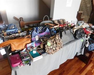 Handbags and purses by Dooney and Bourke, Coach, Vera Bradley as well as snake and Eel skin purses, Over 50 purses