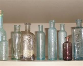 Antique pharmacy bottles.  Looks like most were bottles that were dug up.
