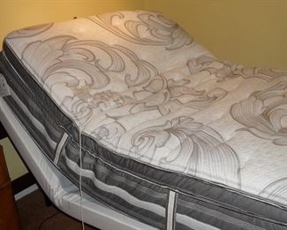 Queen size adjustable bed was only slept in a couple of times.  The mattress is super clean.  Adjustable frame is nice and smooth.