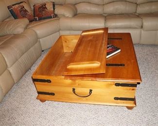 Matching coffee table that lifts up on both sides for tons of storage