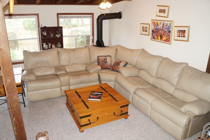 Leather sectional with recliners on the 2 seat side, pull out bed on 3 seat side.  WEIGHS A TON!  Bring friends and a truck.  We absolutely can not help load!