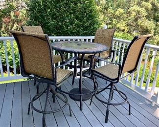 Tall wrought iron patio table w/4 matching chairs and umbrella stand 