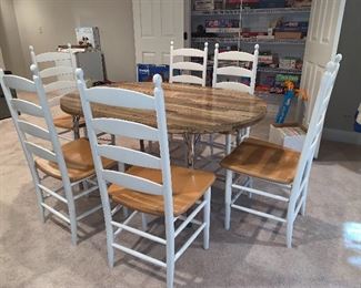Oval table with 6 white ladder back chairs - table sold separately from the chairs  