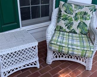 Matching white wicker chairs and table