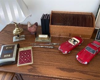 Vintage office items, file box, metal address books, letter openers and to vintage cars