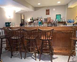 5 matching tall bar chairs - lots of bar items, glasses, bottles, misc.