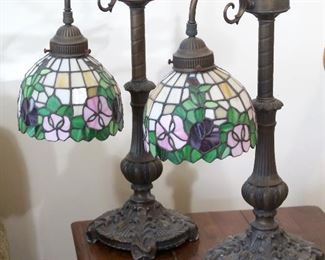 Matching stained glass lamps, old books, ephemera