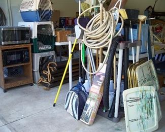 Yard tools and caddy, TV trays, microwaves, dog kennel crates