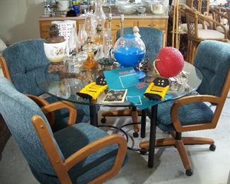 Glass table and chairs, oil lamps, card games