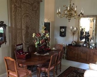 Beautiful formal dining table, leaves, 6 chairs, sideboard and huge needlepoint.