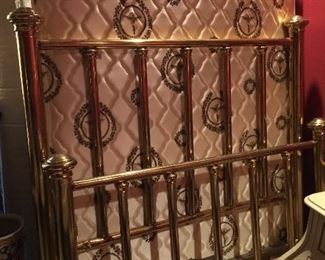 Sold brass queen size bed.
