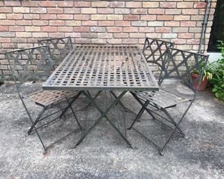 metal outdoor table w/4 chairs  -- really a heavyweight
