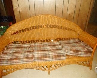Vintage Wicker with Cushion Love Seat..in basement