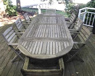 Teak outdoor table & 8 chairs by Kingsley- Bate