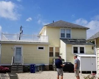 Large amount of top quality siding on home & two-car garage