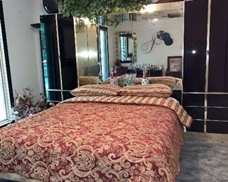 Black Glass and brass Ello Queen Bedroom set/mattress; back mirrored Pier and side cabinets.  Cost new for set: $8,000.00.  selling for $1,500.00 WILL NOT BE 70% OFF