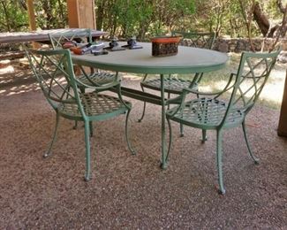 Metal and glass patio set