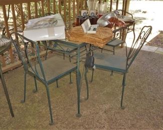 Metal and glass patio set