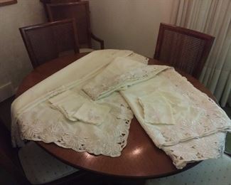 Two banquet sized table cloths with 22 linen napkins